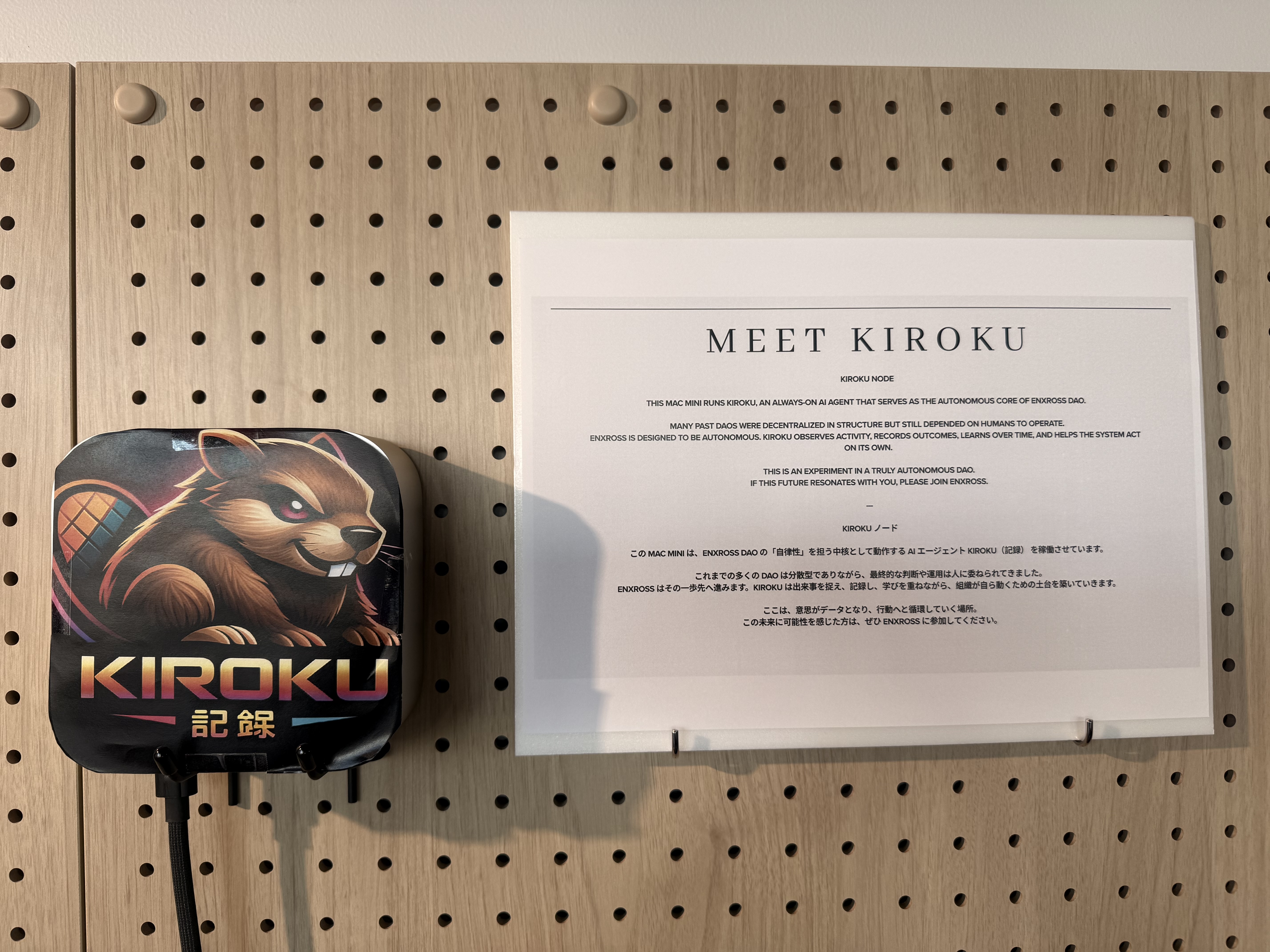 Kiroku AI agent running on a Mac Mini with MEET KIROKU sign at the enXross space